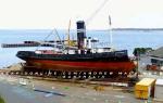 ID 3631 LYTTELTON II (1939/303grt/LR No. 5215521) seen on a Geelong, Australia slip at the beginning of her demolition with the first portion of her bows having fallen to the scrapper torches, last minute...